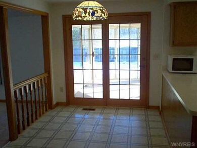 Kitchen Large eating area with door to 3 season ro