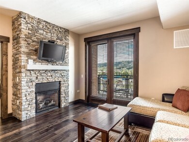 Floor to ceiling natural ledge-stone gas log firep