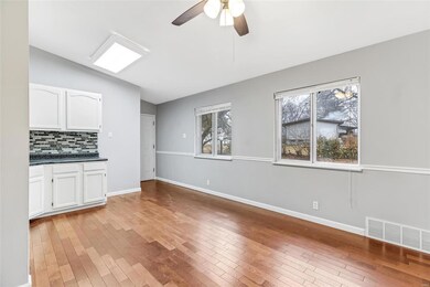 Lots of Natural Light in kitchen - door access to 
