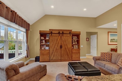 Living Room with views into the back yard. Entranc