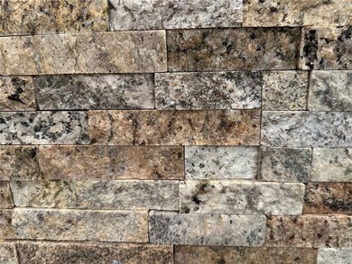 One of a kind natural stone wall.