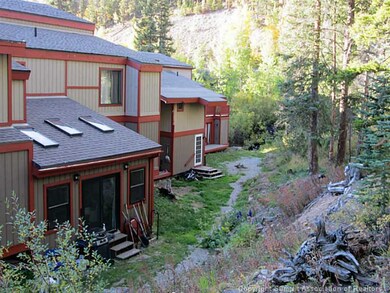 Exterior Back. Skylights Make Sunroom Light and Br