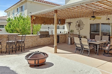 View of Covered Patio with Custom Built-In BBQ, Fi
