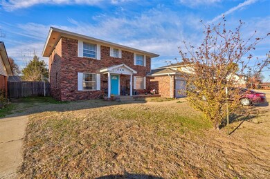 View of front of house featuring a garage and a fr