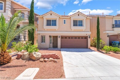 View of front of property with concrete driveway,