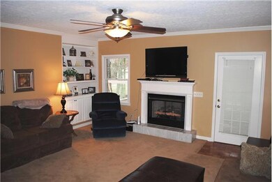 Living Room with Marble Fireplace