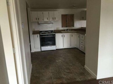 Spacious kitchen with laminate flooring, kitchen w