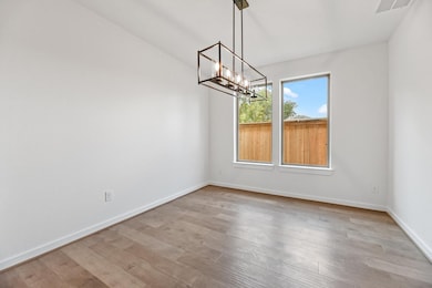 Dinning room that can be used as flex space or downstairs play room.