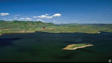 Mountain view featuring a large body of water