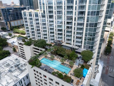 Aerial view of apartment complex and a pool