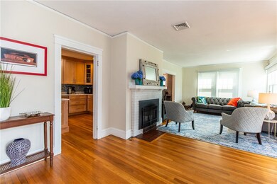 Entry into living room with gas fireplace