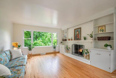 With Fireplace and Great Views of Backyard & Creek
