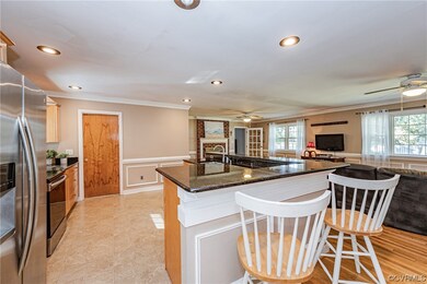 Kitchen featuring plenty of natural light, stainle