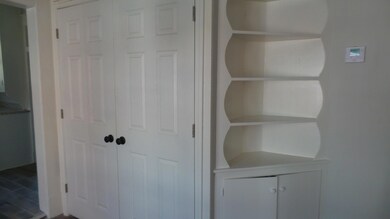 Built-In and Closet in Dining Room