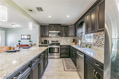 Beautiful kitchen with stainless steel appliances 