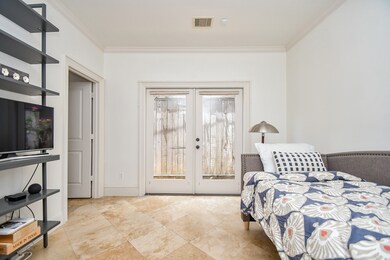 First floor ensuite bedroom with patio access and