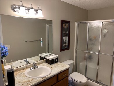 Your bath with step in shower.