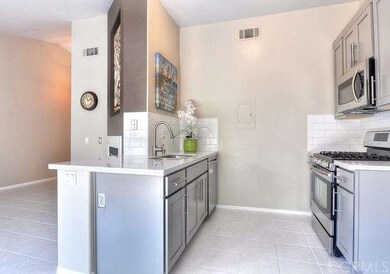 Gleaming modern kitchen makes cooking a breeze.