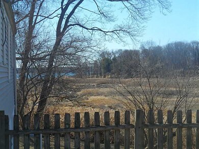 View. Water view from upper tier side yard