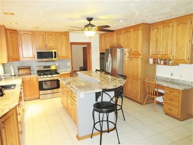 Kitchen:New granite counter tops, new ceiling fan 