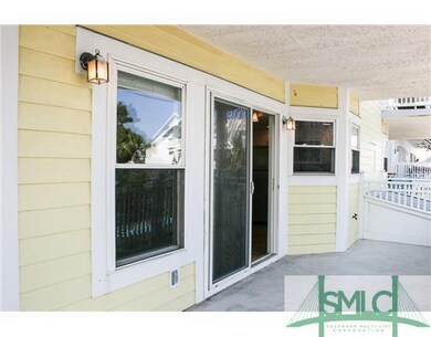 Exterior Front. large porch wraps the corner and i