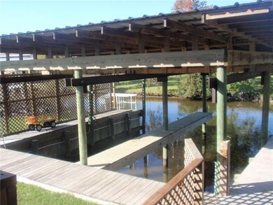 Exterior Back. Double boat stalls - one with lift 