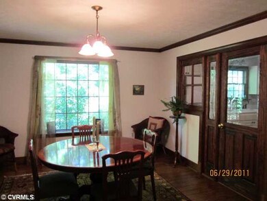 Dining Room - Glass paneled pocket doors on R open