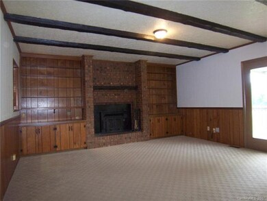 Family Room has fireplace & built-ins.