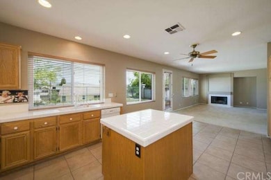 The kitchen is very spacious and is open to the la