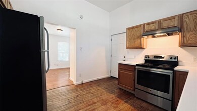 Kitchen featuring appliances with stainless steel