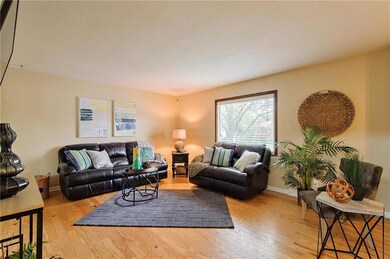 Main level Living Room is open and bright! You'll 