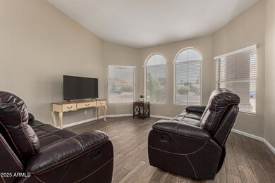 Living room w/ picture windows