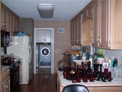 Main floor laundry, off kitchen with 1/2 bath.