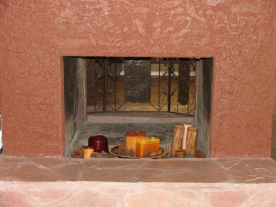 Two way fireplace/living room and family