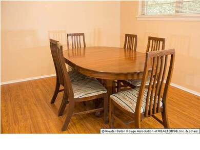 Adjacent to the Kitchen is the Dining Area....