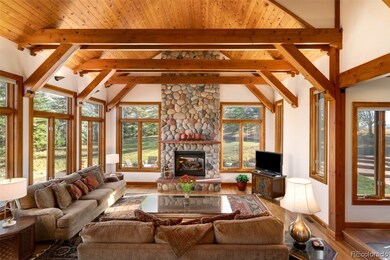 Post and beam construction and floor to ceiling windows in the great room highlight the exceptional views and let in abundant natural light. 
