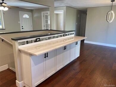 Oversized counters or you can add bar stools for m