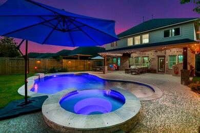 Beautil gunite pool with LED color changing lights.