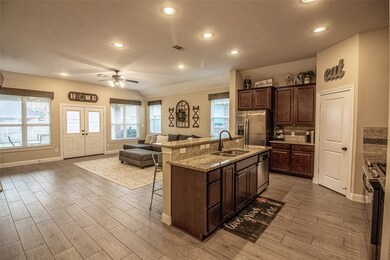 Granite counters, stainless steel appliances, lots