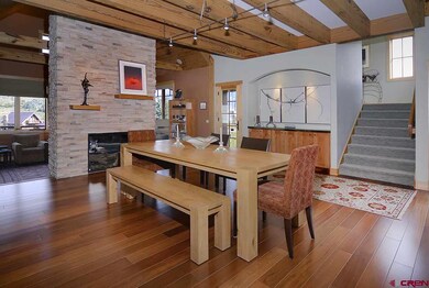 Dining room with drystack fireplace
