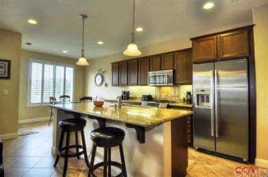 Gorgeous kitchen with granite counter tops, stainl