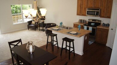 Awesome kitchen with hardwoods and soft close solid wood cabinets. GE stainless appliances.