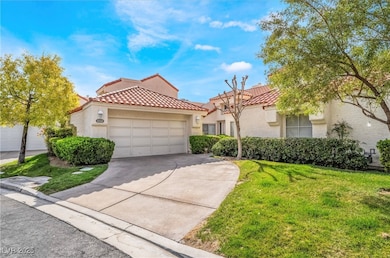 Mediterranean / spanish-style house with a front l