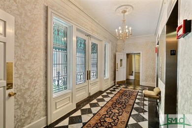 Elegant main entry lobby to elevators.