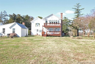 Back of the home.  Large deck on the first floor p