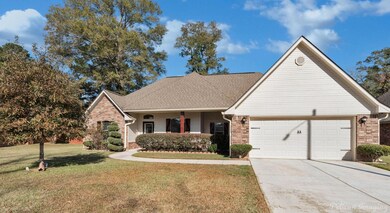 View of front of property with a front lawn and a 