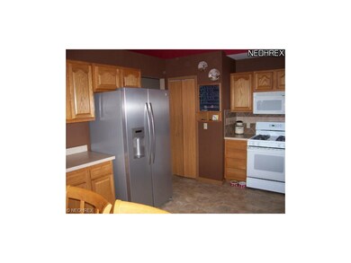 Additional cabinet storage space.  (Refrigerator i