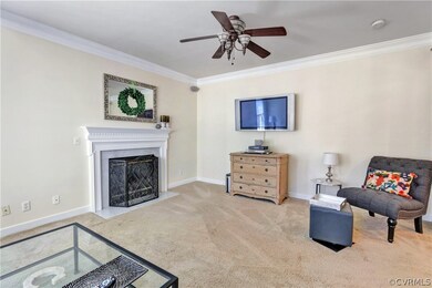 Family room with crown molding, fireplace ....