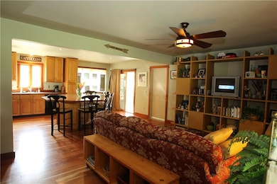 Open concept living and kitchen area. Beautiful ch