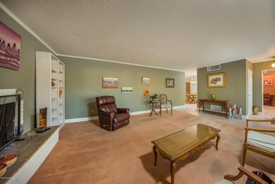 Livingroom with 3/BR or office on right.